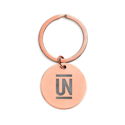 Engraved Stainless Steel Round Keychain — Uncommon Schools Logo