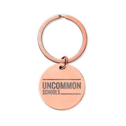 Engraved Stainless Steel Round Keychain — Uncommon Schools Logo