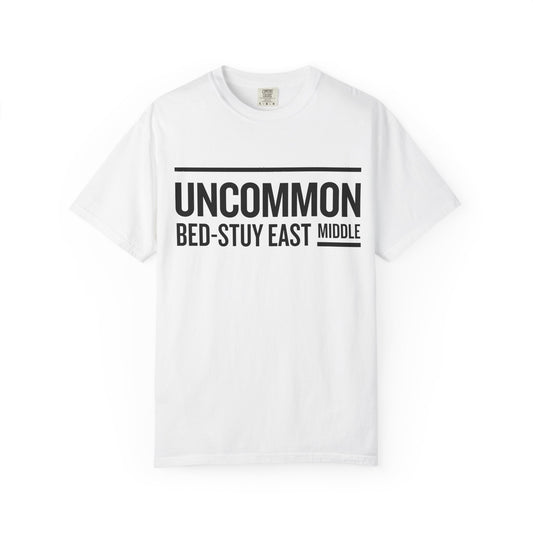 White t-shirt with black text on a white background